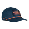 front view photo of deep sea water hat. large patch on front with seaborn outfitters in salmon on dark blue background. salmon rope across bill. salmon waves logo on right side.