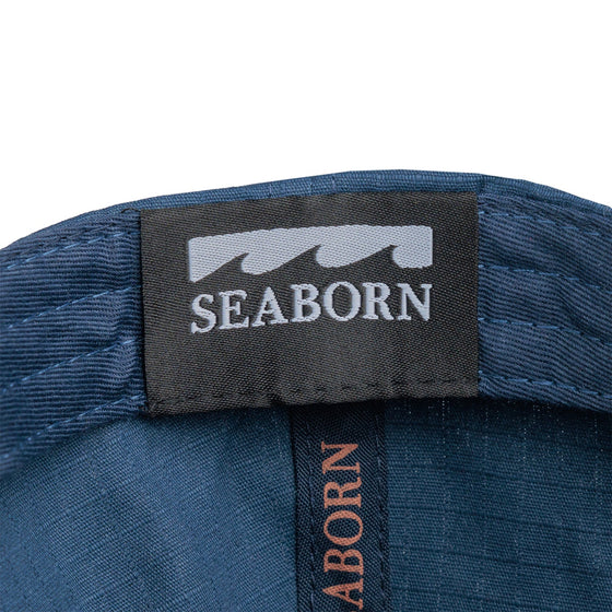 detail photo of inside tag. seaborn wave logo and seaborn text in white on black background.