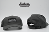 Front and rear view of Seaborn Charcoal Dad hat with Seaborn wave patch on front